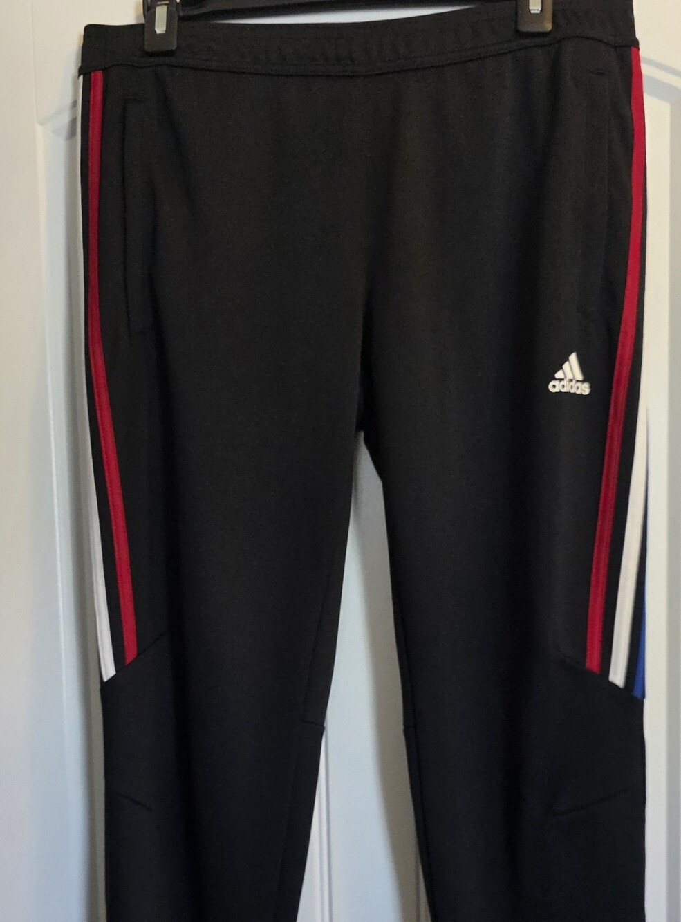 Adidas Men's Black Joggers with Red, White & Blue Side Stripes And Ankle Zipper.